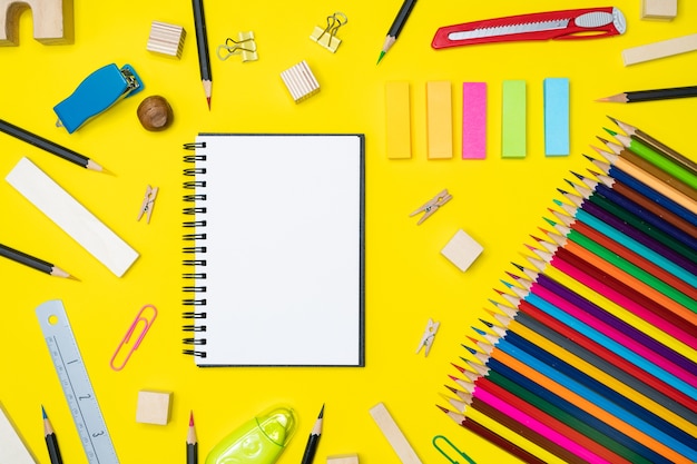 Minimal work space Colorful background with many crayons