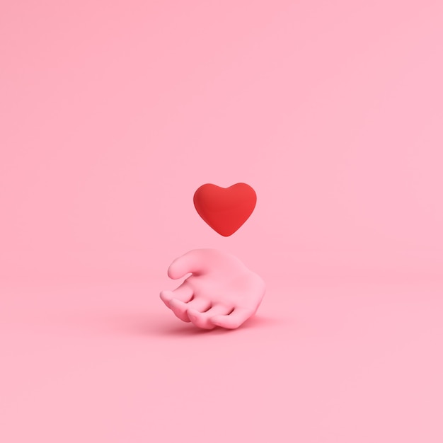 Minimale scène van hand met drijvend hart, Valentine-concept.