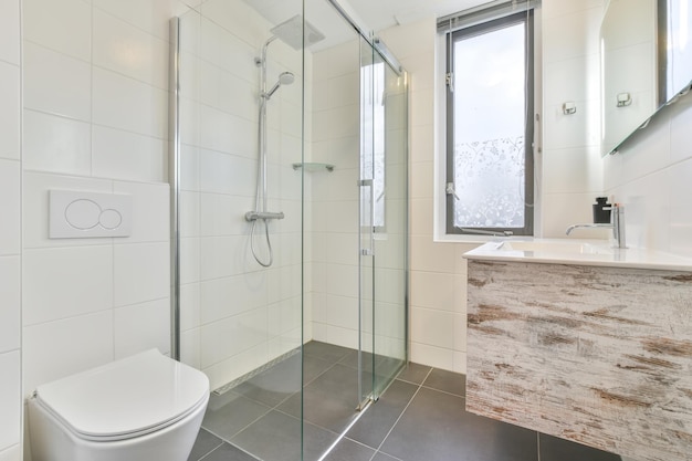 Minimalist bathroom with illuminated mirror