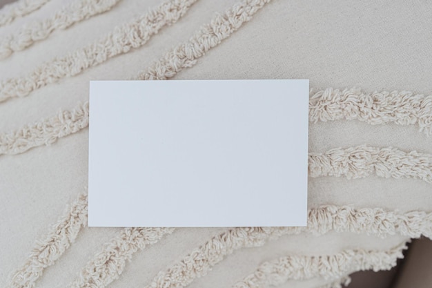 Minimalist business card mockup on fabric texture. Blank card template