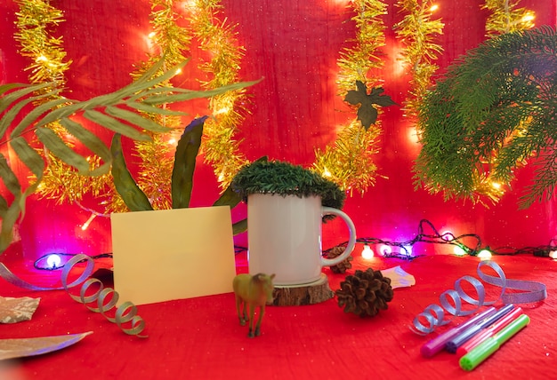 Minimalist concept idea displaying products. coffee mug on christmas and new year background