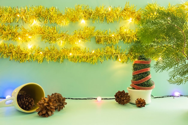 Minimalist concept idea displaying products. cosmetic bottles on christmas and new year background. pine flower, lamp