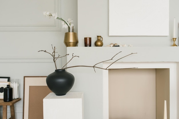 Minimalist living room decor in Scandinavian or Japanese style Different vases with branches