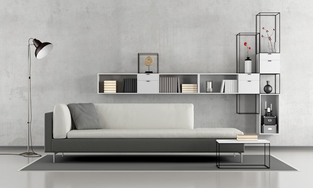 Foto salotto minimalista con divano e libreria moderna sul muro di cemento