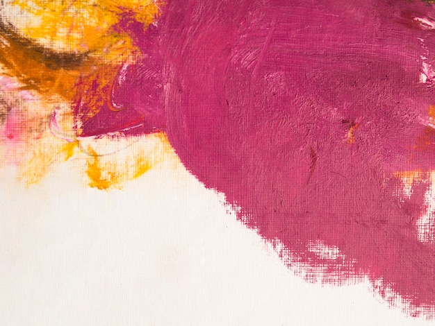 Photo minimalist painting with pink and yellow strokes