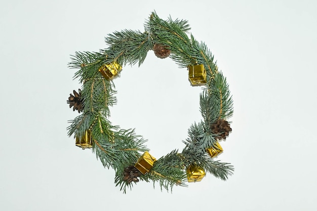 Minimalistic Christmas wreath on white background