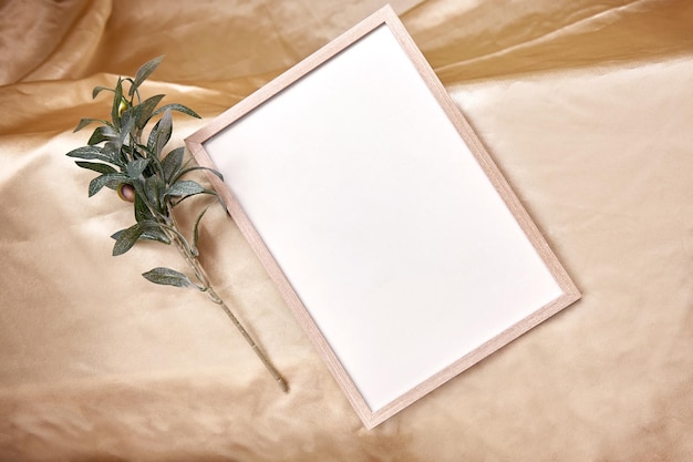 Minimalistic mock up frame background with olive tree branch High quality photo