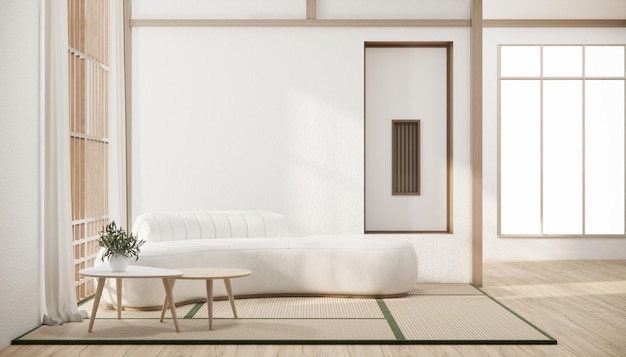 Minimalistische woonkamer in Japanse stijl ingericht met een bank