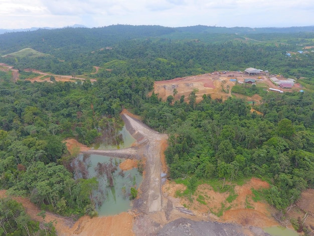 mining activities, coal getting, hauling and loading at a coal mining Project. Aerial view.