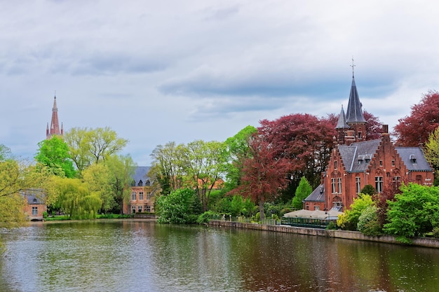 Minnewaterpark and Minnewater lake in the old town of Brugge, Belgium.