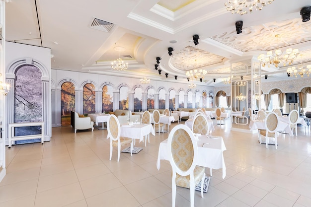 MINSK BELARUS DECEMBER 2017 interior of the equipped huge banquet hall in white color style