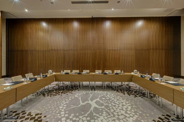 MINSK BELARUS JULY 2017 rows of seats in interior of modern empty conference hall for business meetings