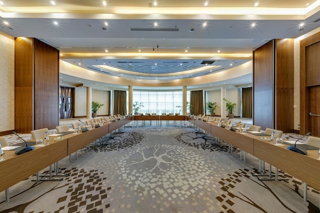 MINSK BELARUS JULY 2017 rows of seats in interior of modern empty conference hall for business meetings