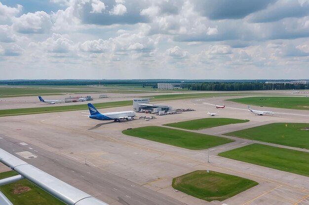 Photo minsk belarus june 16 2021 minsk international airport the view from the window dwindled to the runway and airplanes international passenger transportation