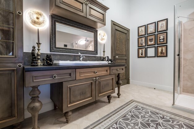 MINSK BELARUS MAY 2021 metal water tap sink with faucet in expensive bathroom with bathtub washing machine and mirror