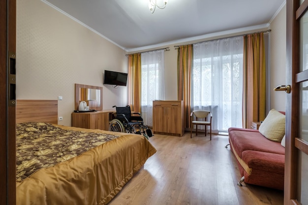 Minsk belarus october 2020 interior of the bedroom with
wheelchair in apartments or hotel for people with disabilities
disabled people old people pregnant women