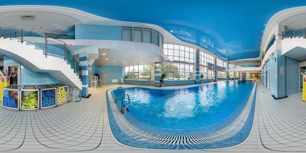 MINSK BELARUS SEPTEMBER 2017 Panorama 360 angle view in interior of modern swimming pool in elite sport center Full 360 degree seamless panorama in equirectangular spherical projection