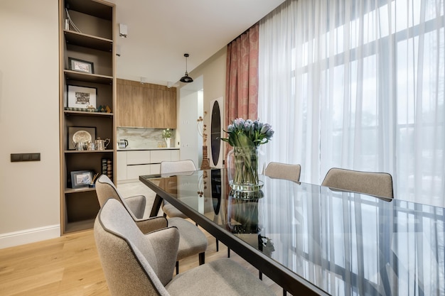 MINSK BELARUS SEPTEMBER 2020 Interior of the modern luxure vip guestroom in studio apartments with sofa and table