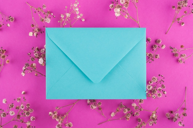 Mint envelope on pink