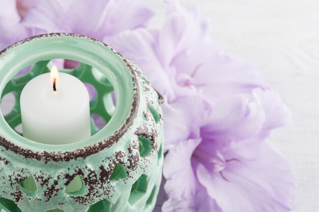 Mint green candlelight and purple flowers