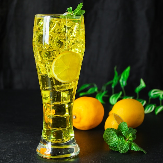 Mint lemonade with ice in a glass