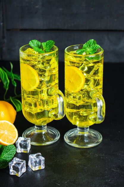 Mint lemonade with ice in glasses