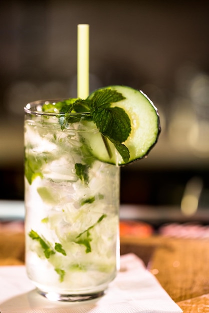 Mint Mojito with garnishes at the bar.