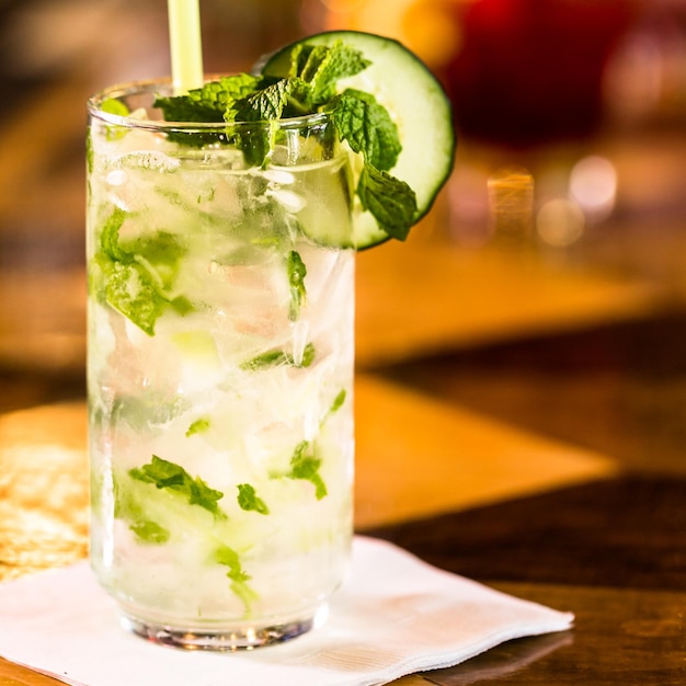 Mint Mojito with garnishes at the bar.