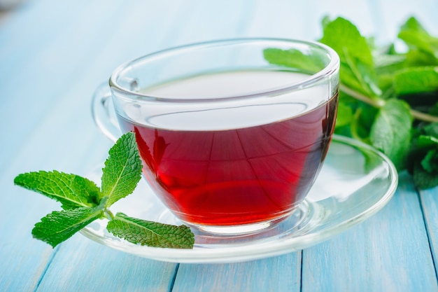 Mint tea n wooden wooden background