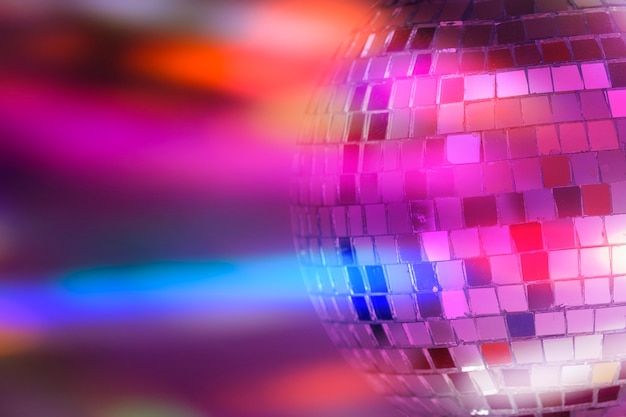 Mirror ball with colorful background. night club. High quality photo