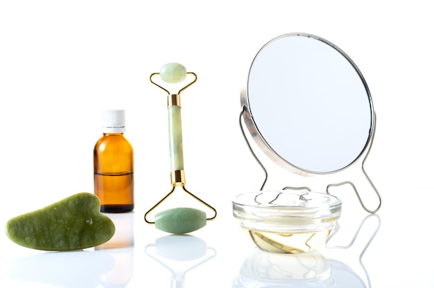 Mirror and cosmetic accessories Do a facial massage Body skin care and wore Isolated