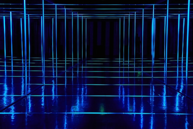 Mirror walkway lined with blue neon lights