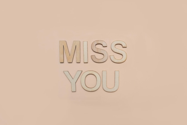 Photo miss you in wooden letters