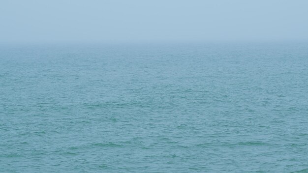 Photo mist over sea sea dissolving in the fog line of the horizon dissolving in the fog real time