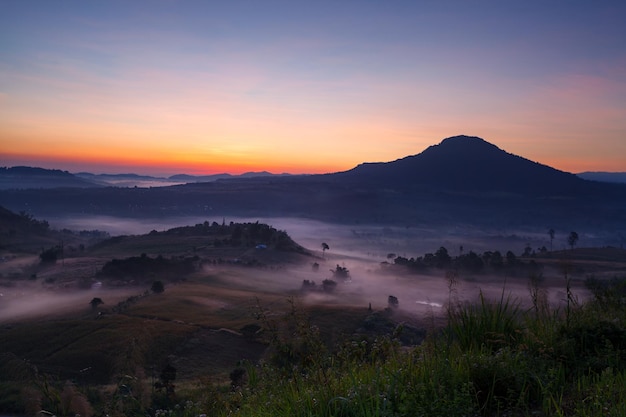 Misty morning sunrise in Khao Takhian Ngo View Point at Khaokho PhetchabunThailand