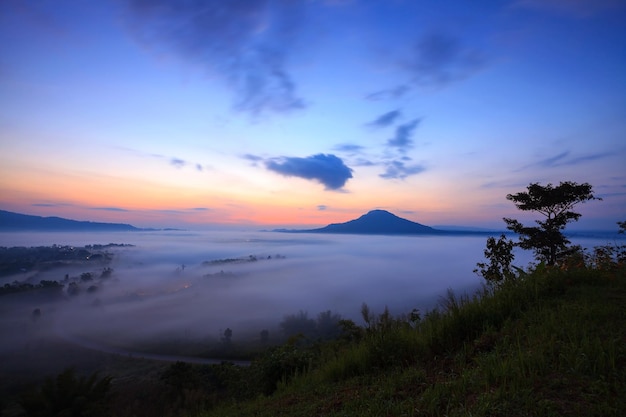 Misty morning sunrise in Khao Takhian Ngo View Point at Khaokho PhetchabunThailand