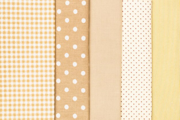 Mix of beige, white and brown cotton fabric.