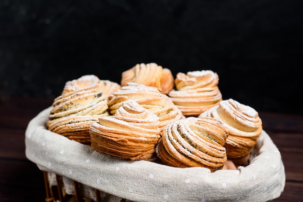 Photo mix of croissants and muffins.