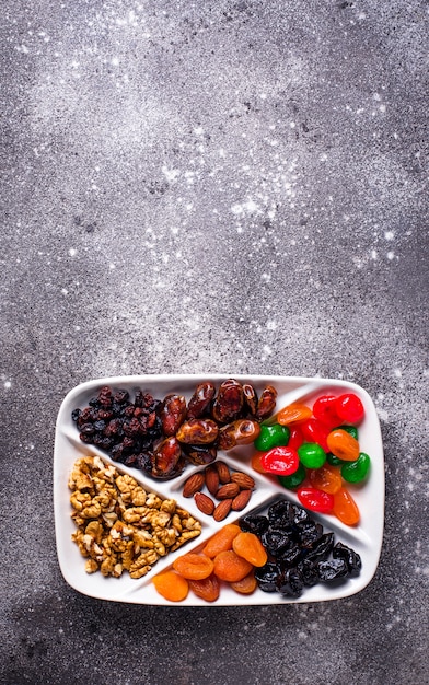 Mix of dried fruits and nuts in plate