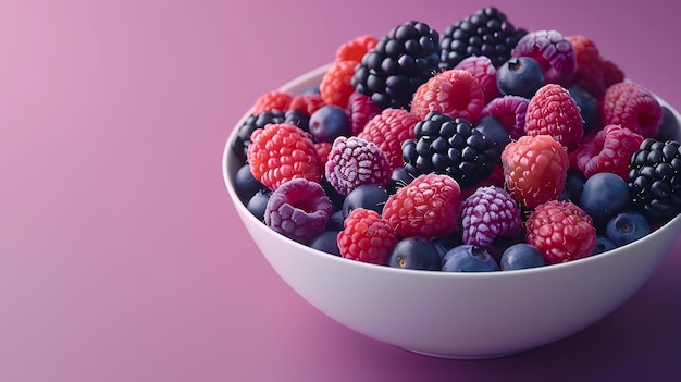 Mix of fresh berries in a bowl on purple background with copy space