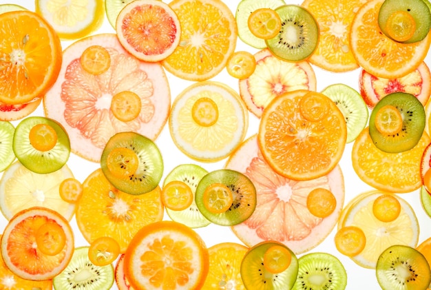 Photo mix of fresh transparent citrus fruits on white luminous background