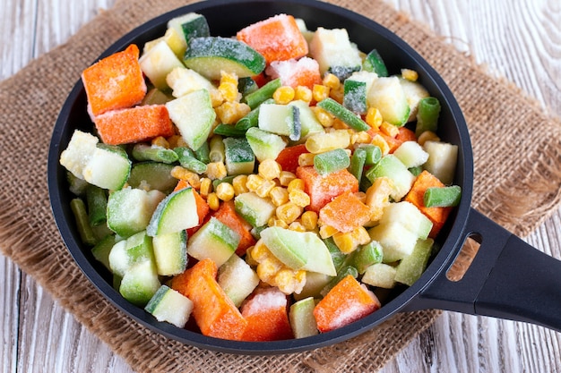 Mix of frozen vegetables in the pan. Studio Photo