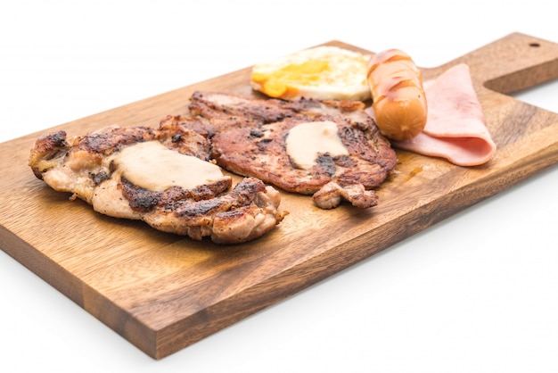 mix grilled steak on wood plate