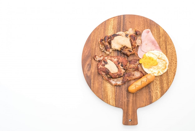 mix grilled steak on wood plate