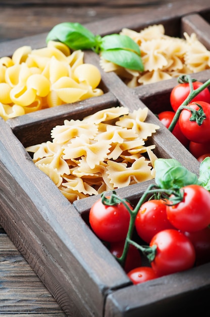 Mix of italian pasta in the wooden box