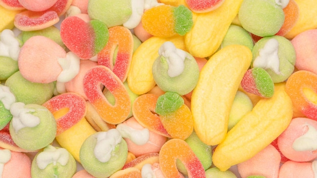 Mix of jelly candys and marshmallows as a background