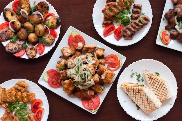 Mix kebab on a plate top view