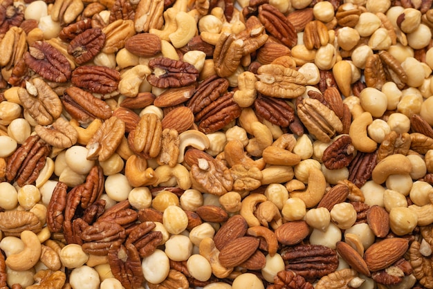 Photo mix of nuts as a background. top view.
