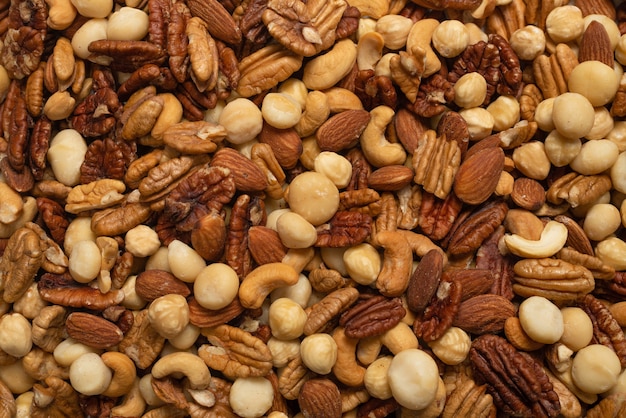 Mix of nuts as a background. Top view.