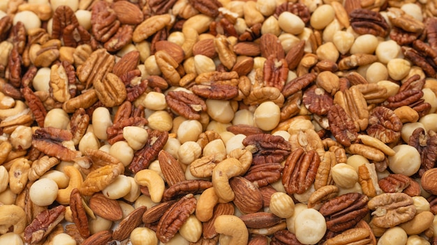 Mix of nuts as a background. Top view.